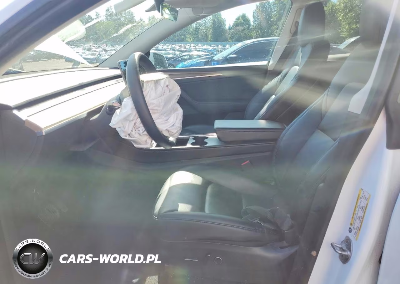 2023 Tesla Model Y VIN:7SAYGDEEXPF637972 - 7