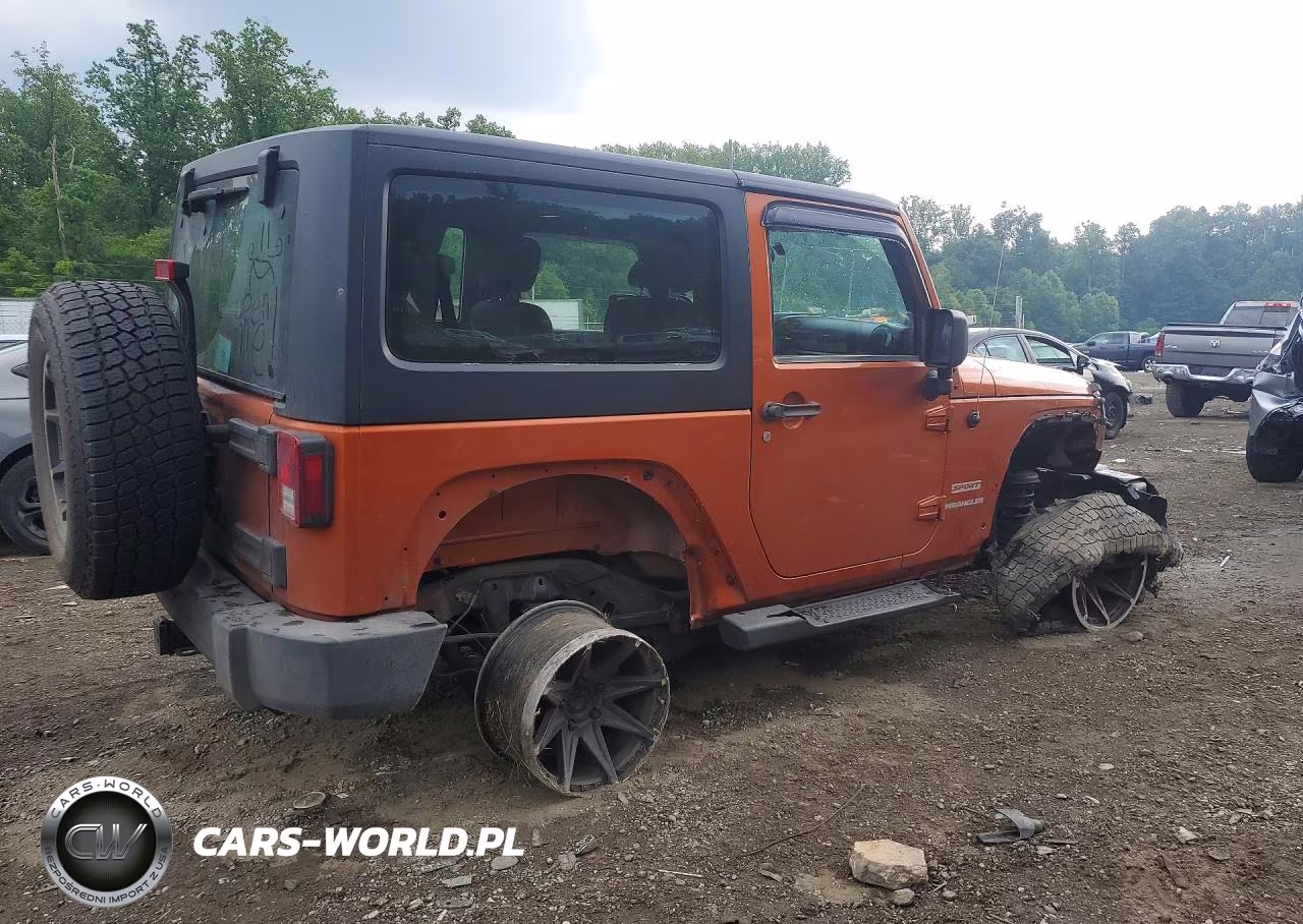 2011 Jeep Wrangler Sport VIN:1J4AA2D14BL594166 - 3