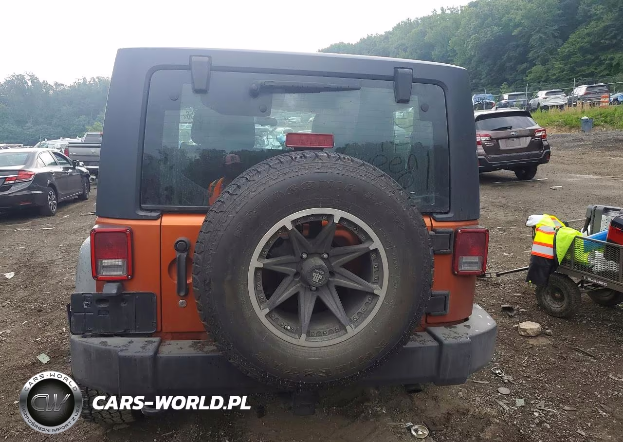 2011 Jeep Wrangler Sport VIN:1J4AA2D14BL594166 - 6