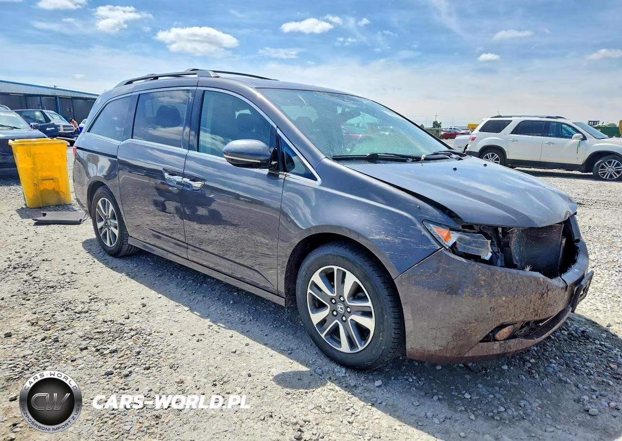 2015 Honda Odyssey Touring VIN:5FNRL5H97FB090773 - 4