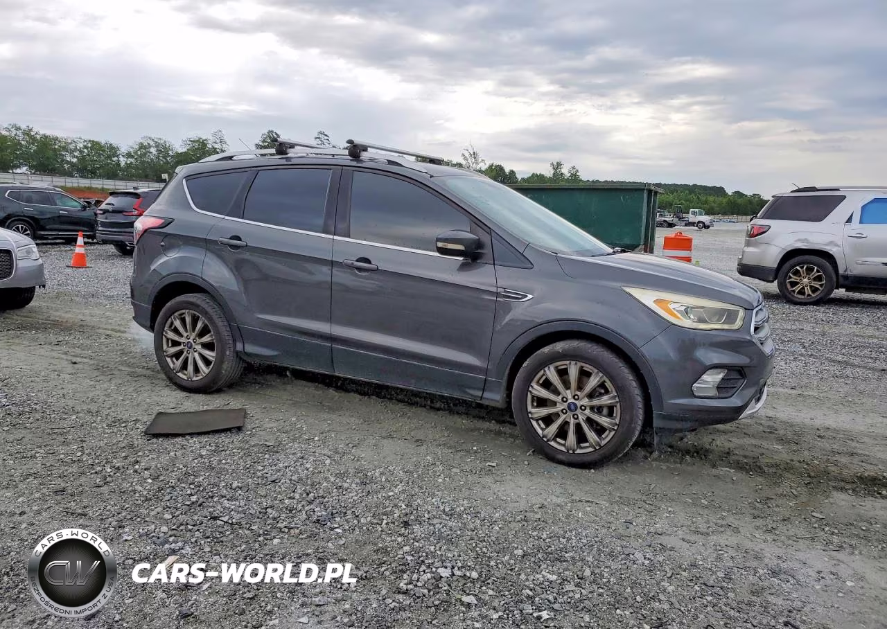 2017 Ford Escape Titanium VIN:1FMCU0J92HUE42776 - 4
