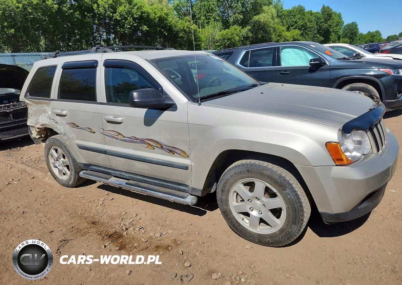 2009 Jeep Grand Cherokee Laredo VIN:1J8HR48P49C553398 - 4
