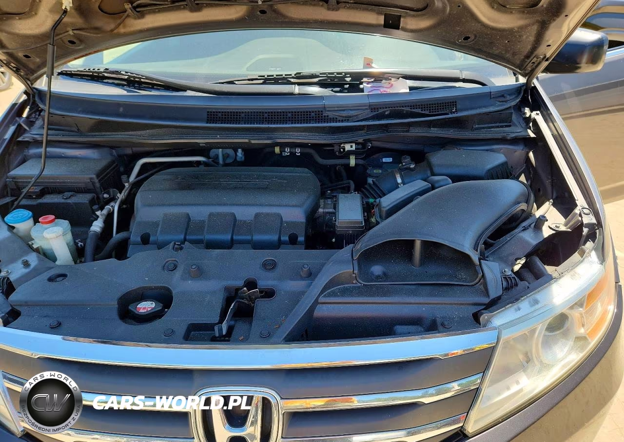 2012 Honda Odyssey Exl VIN:5FNRL5H66CB069821 - 12