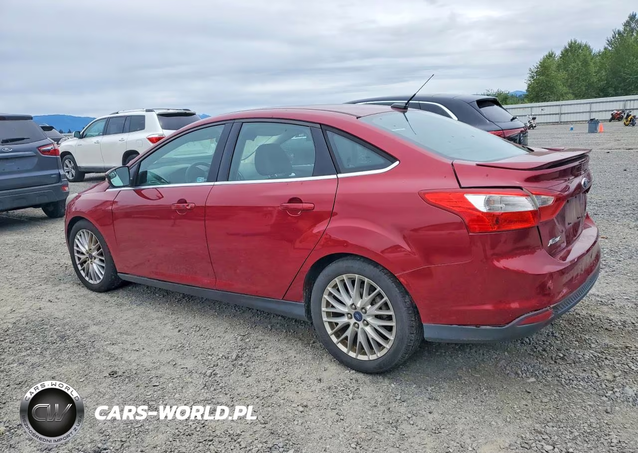 2014 Ford Focus Titanium VIN:1FADP3J2XEL312255 - 2
