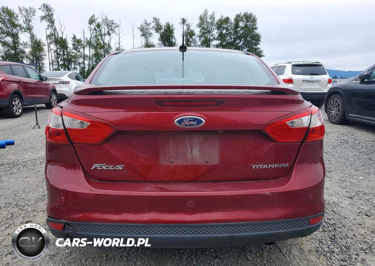 2014 Ford Focus Titanium VIN:1FADP3J2XEL312255 - 6