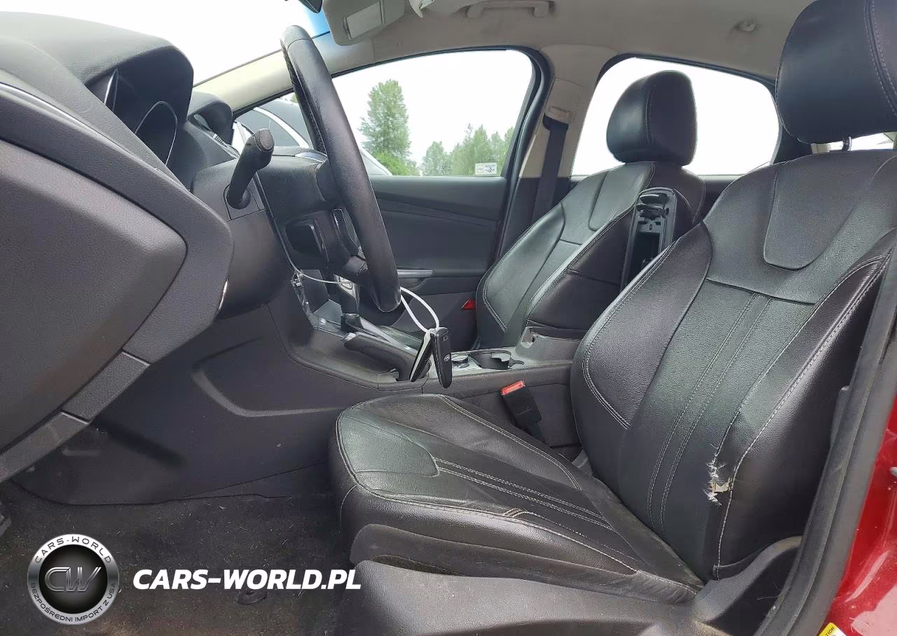 2014 Ford Focus Titanium VIN:1FADP3J2XEL312255 - 7