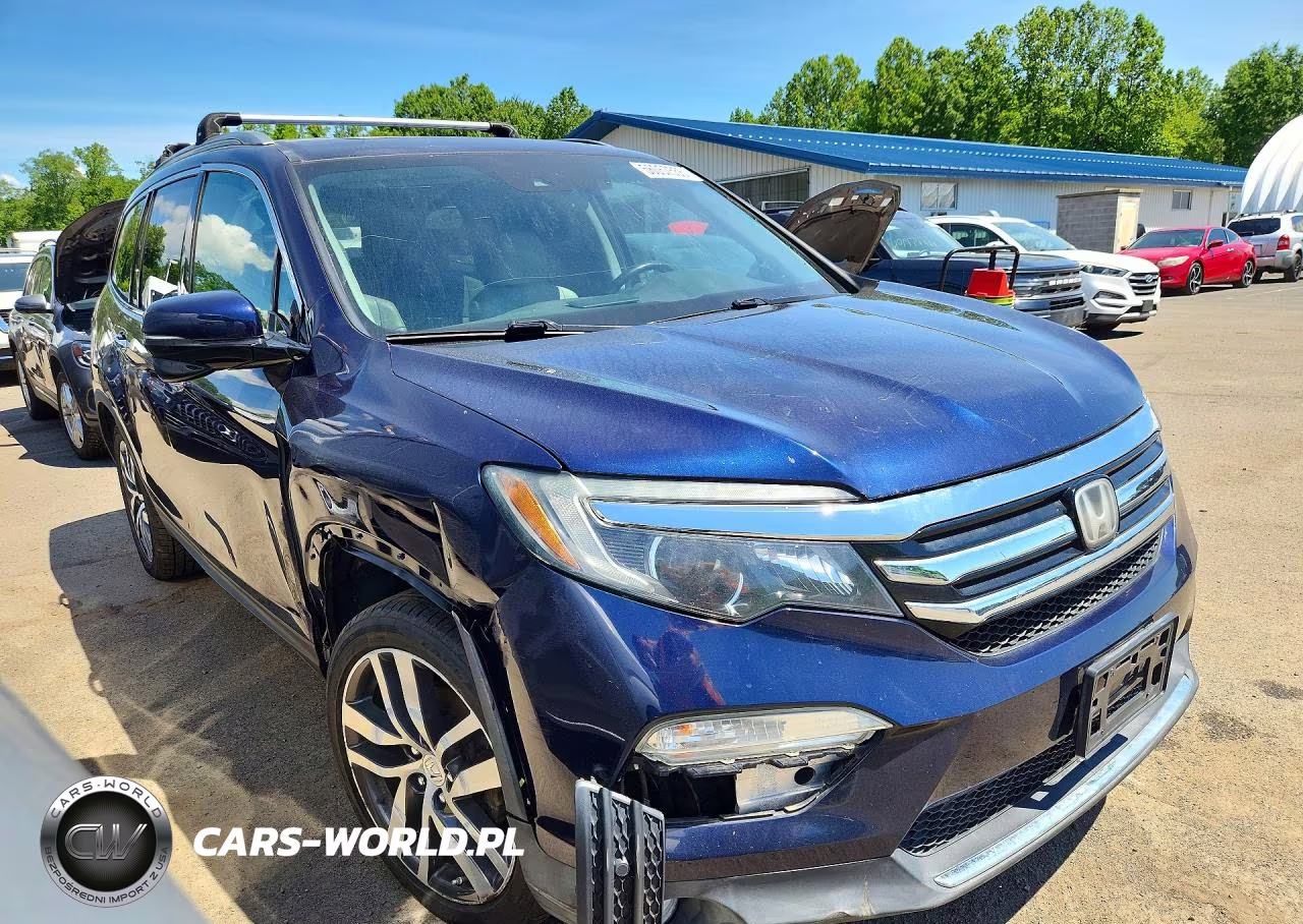2017 Honda Pilot Touring VIN:5FNYF6H91HB066397 - 4