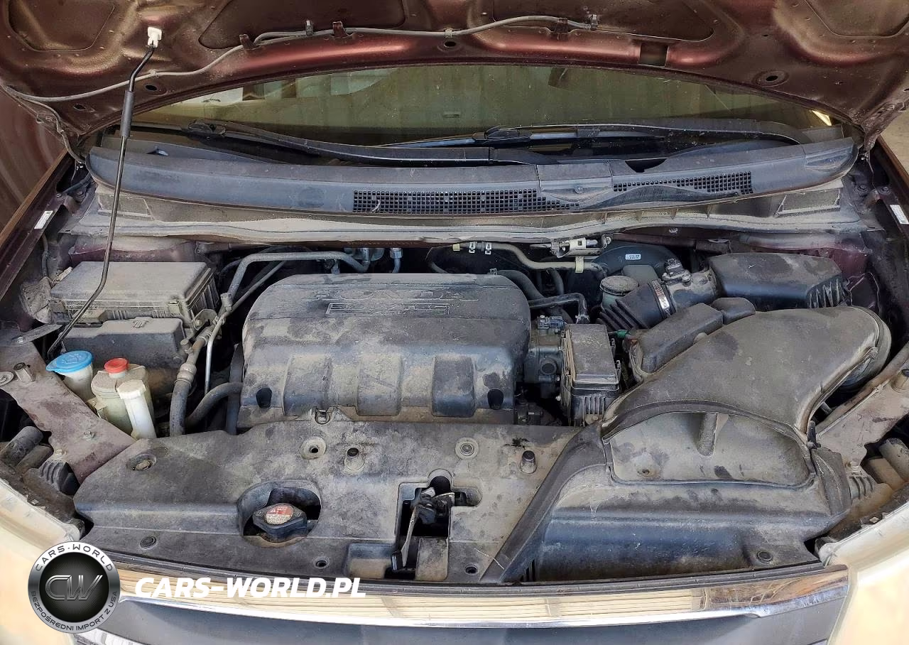 2012 Honda Odyssey Exl VIN:5FNRL5H6XCB122410 - 12