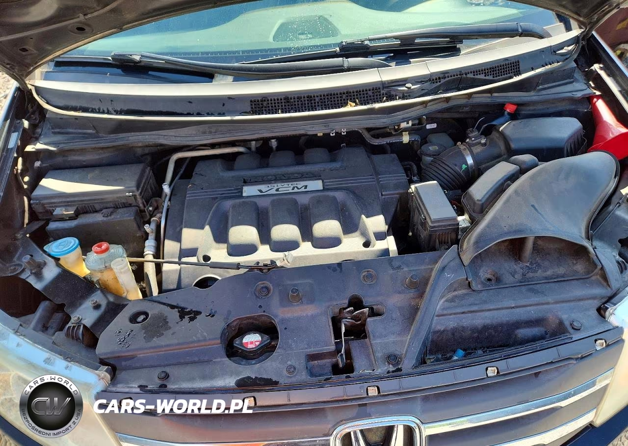 2012 Honda Odyssey Touring VIN:5FNRL5H94CB008672 - 12