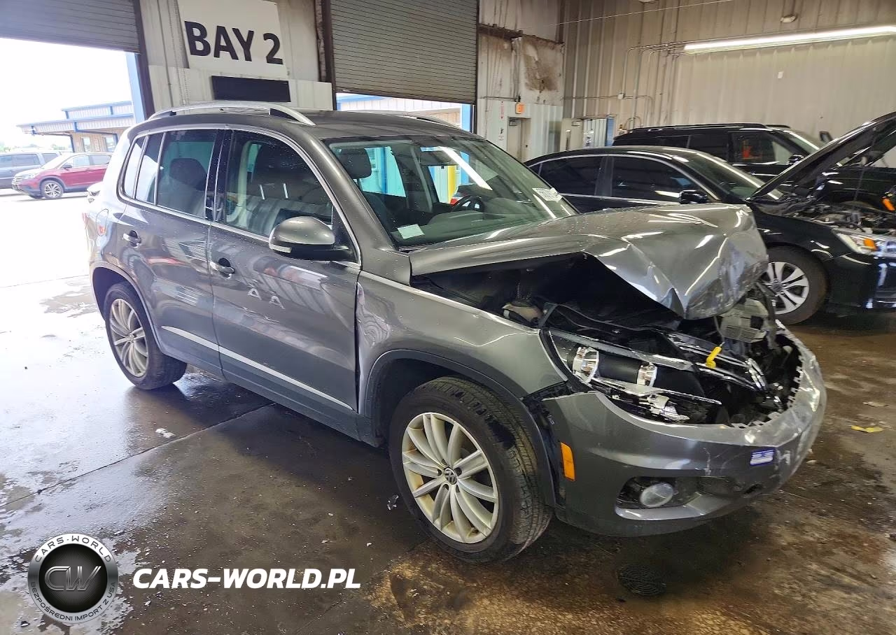 2014 Volkswagen Tiguan S VIN:WVGBV3AX4EW591814 - 4