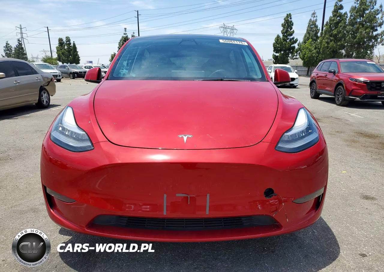 2023 Tesla Model Y VIN:7SAYGDEE8PA041921 - 5