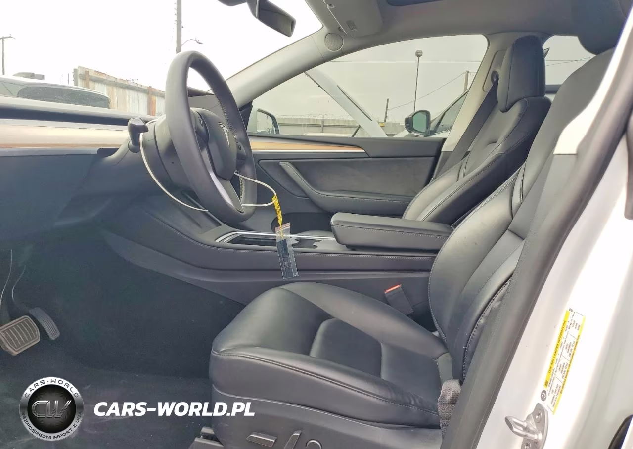 2023 Tesla Model Y VIN:7SAYGAEE1PF881184 - 7