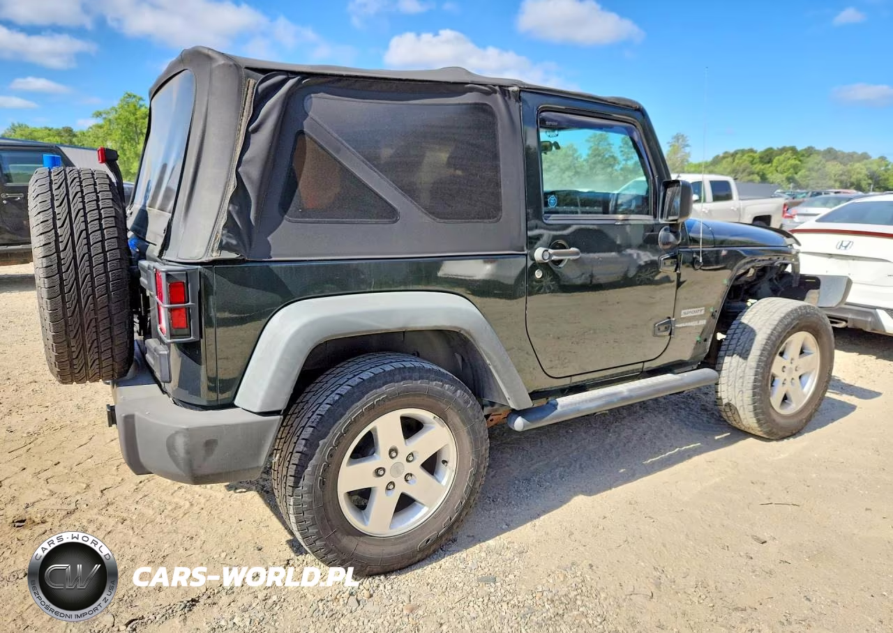 2011 Jeep Wrangler Sport VIN:1J4AA2D15BL601691 - 3