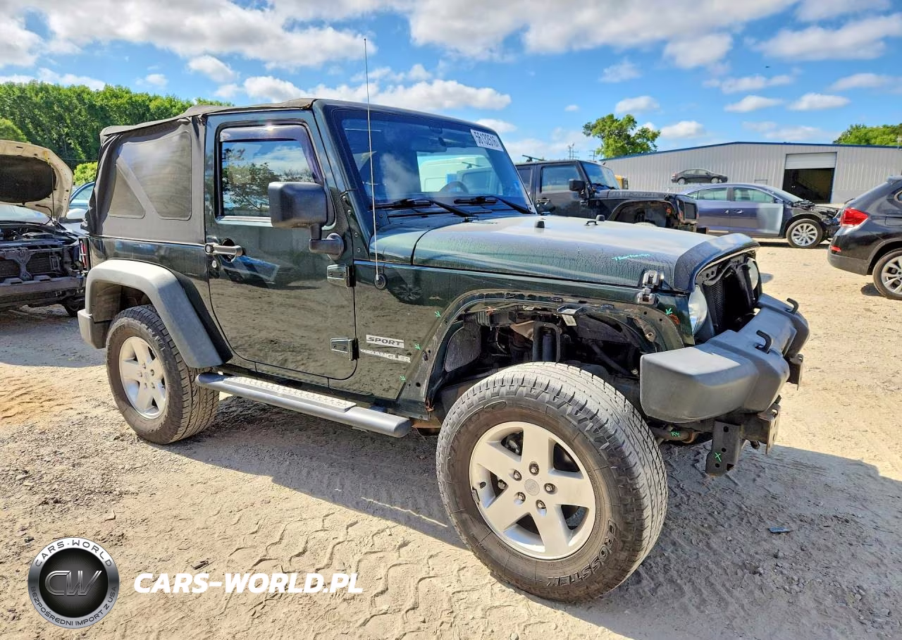 2011 Jeep Wrangler Sport VIN:1J4AA2D15BL601691 - 4