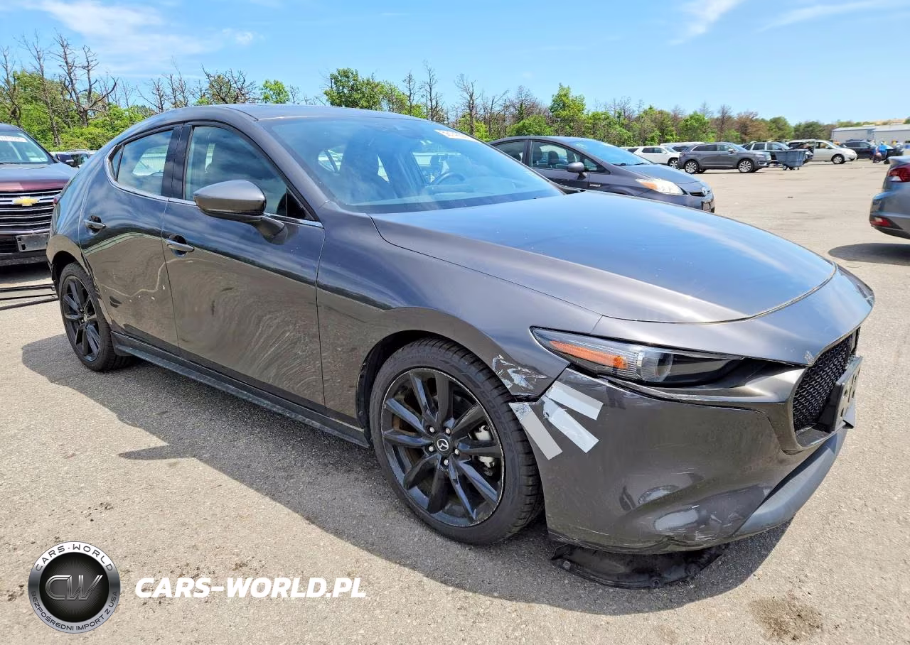 2019 Mazda 3 Premium VIN:JM1BPBNM5K1131854 - 4