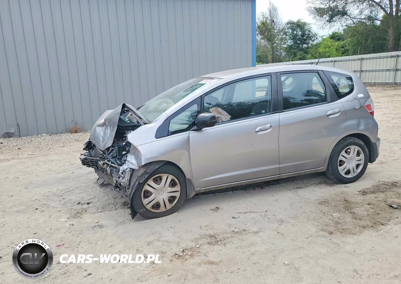 2009 Honda Fit VIN:JHMGE882X9S043460 - 1