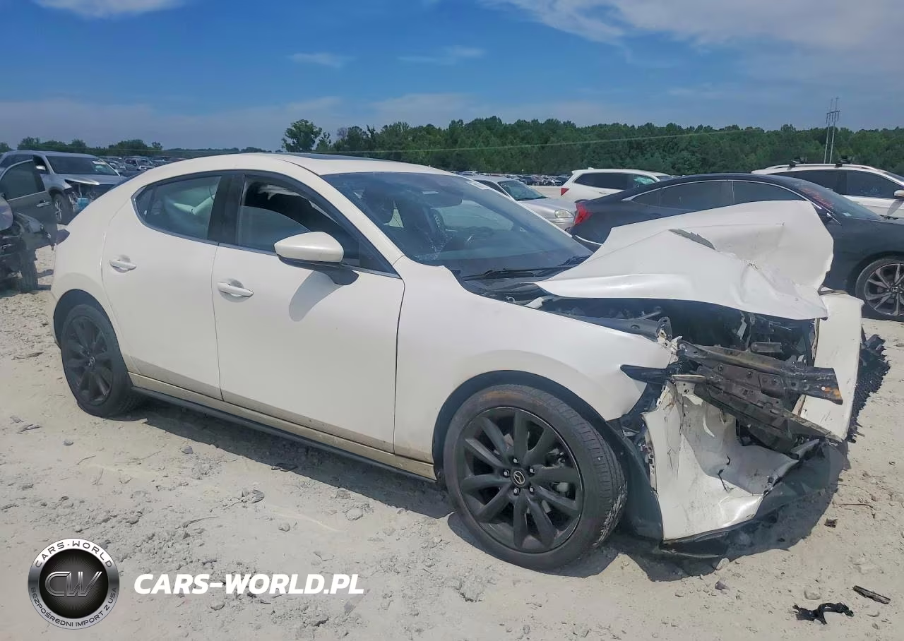 2022 Mazda 3 Premium VIN:JM1BPBML7N1506611 - 4