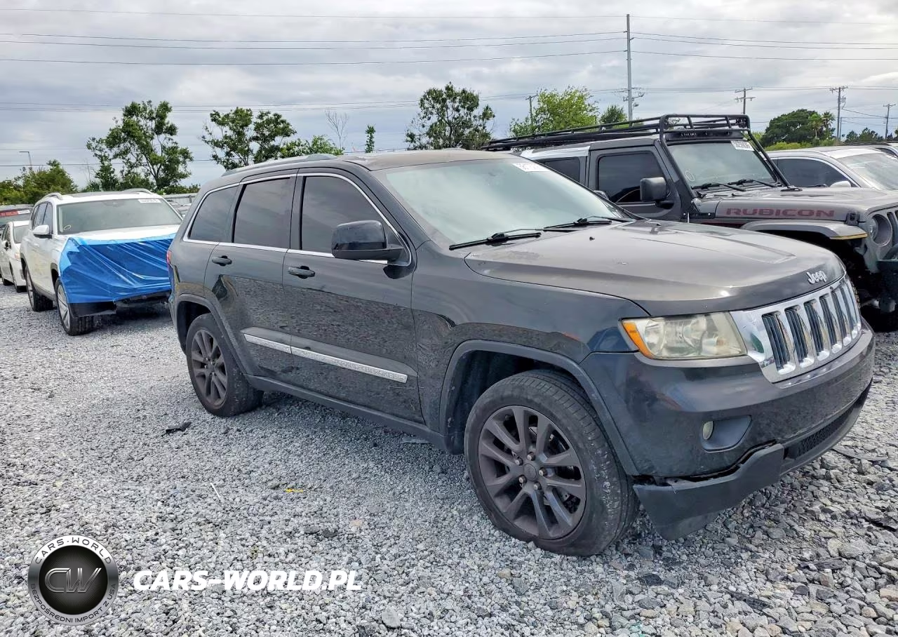 2012 Jeep Grand Cherokee Laredo VIN:1C4RJEAT2CC281859 - 4