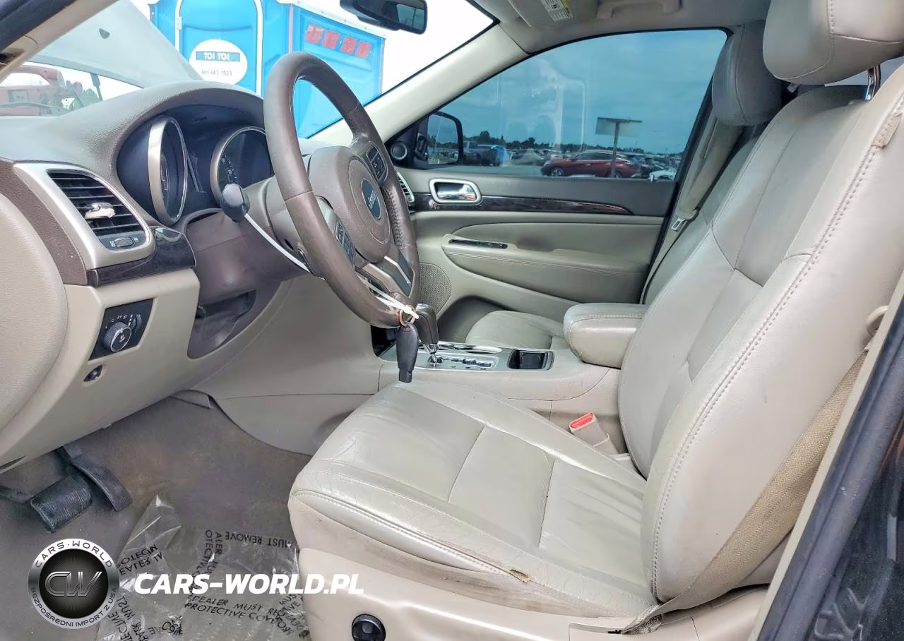 2012 Jeep Grand Cherokee Laredo VIN:1C4RJEAT2CC281859 - 7