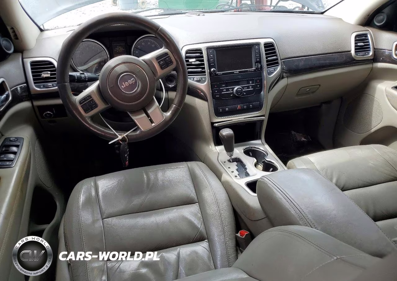 2012 Jeep Grand Cherokee Laredo VIN:1C4RJEAT2CC281859 - 8