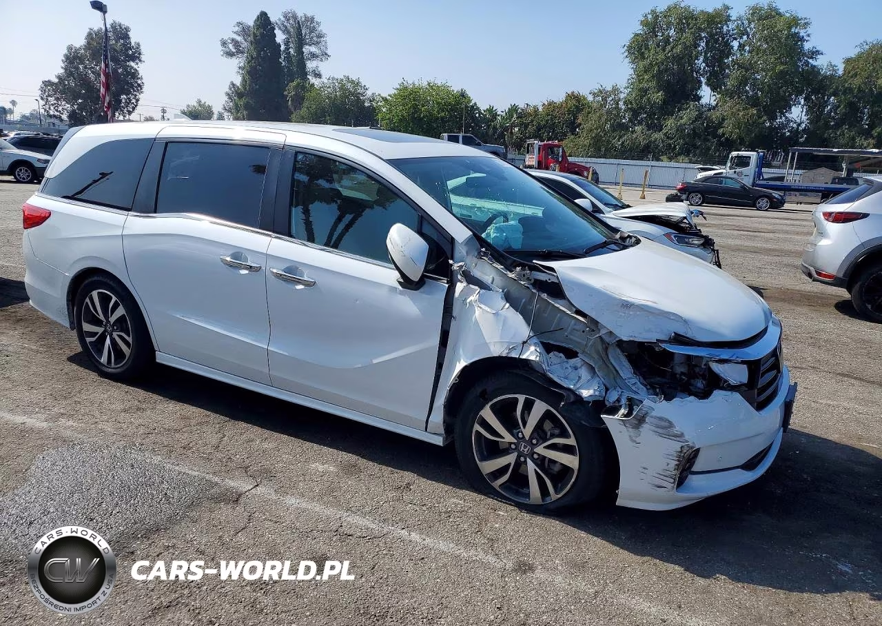 2023 Honda Odyssey Touring VIN:5FNRL6H88PB043802 - 4