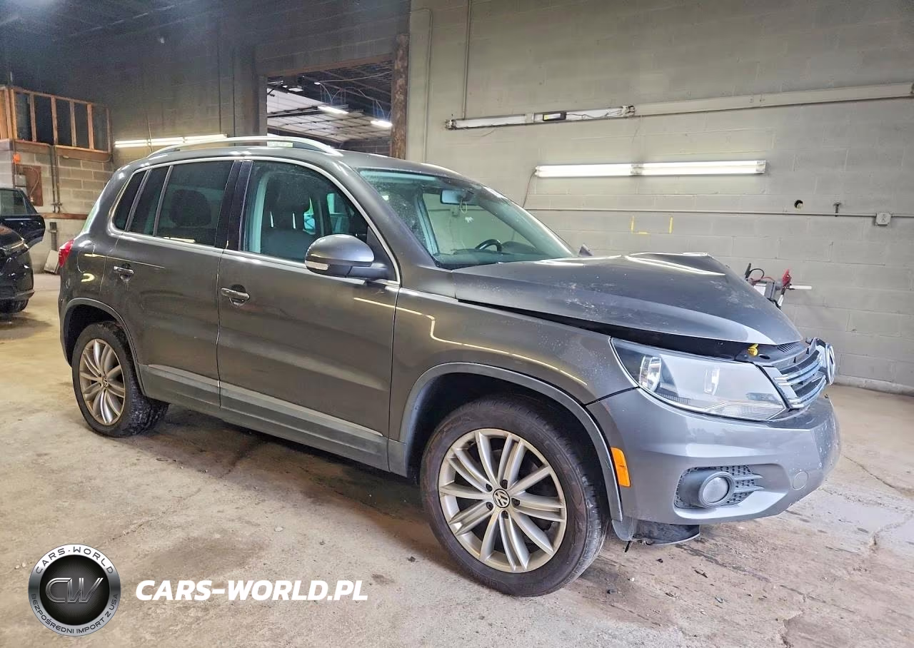 2014 Volkswagen Tiguan S VIN:WVGAV3AX4EW616514 - 4