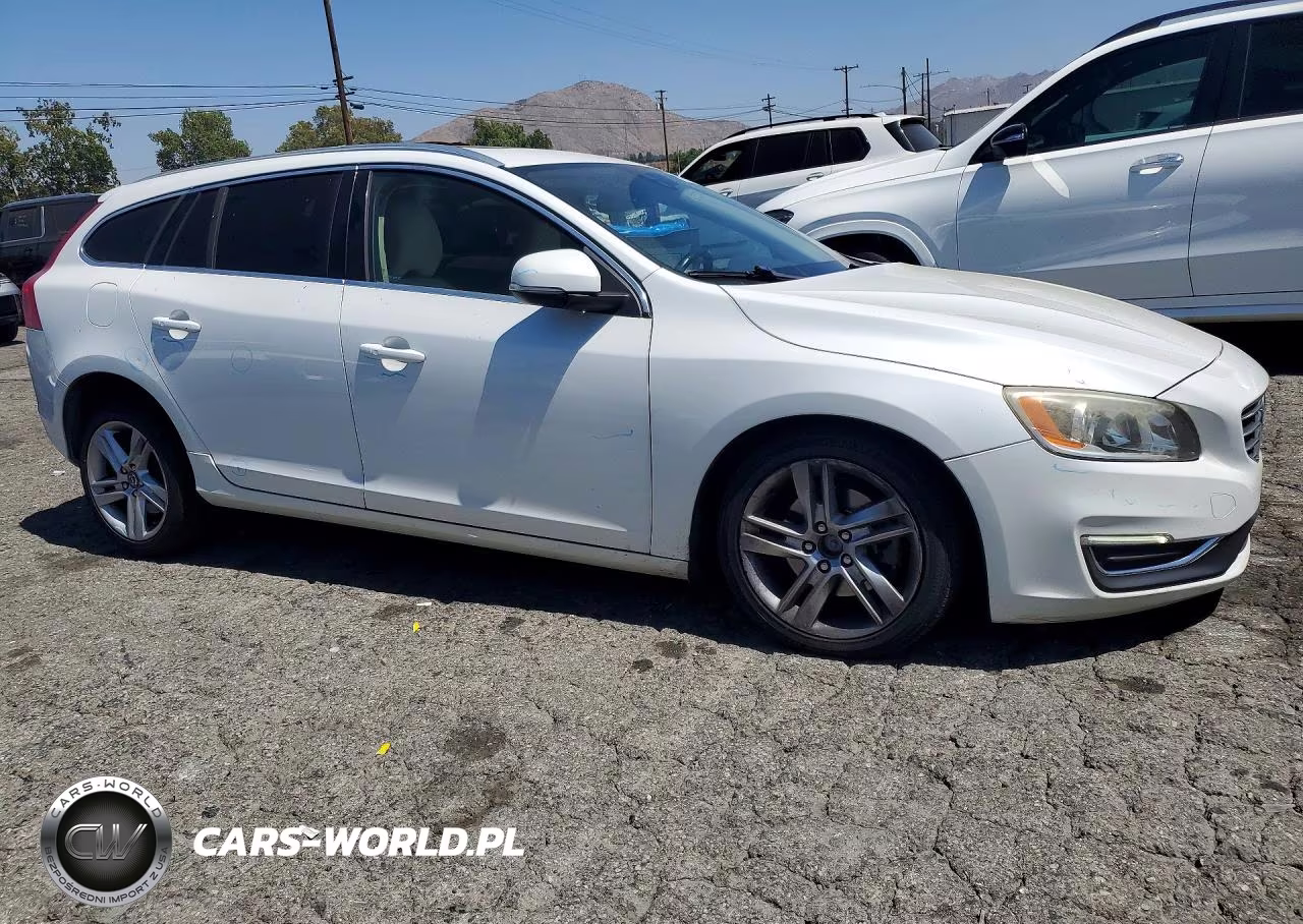 2015 Volvo V60 Premier VIN:YV140MEBXF1208094 - 4