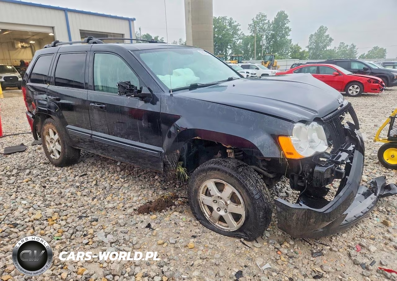 2009 Jeep Grand Cherokee Laredo VIN:1J8HR48P99C539836 - 4