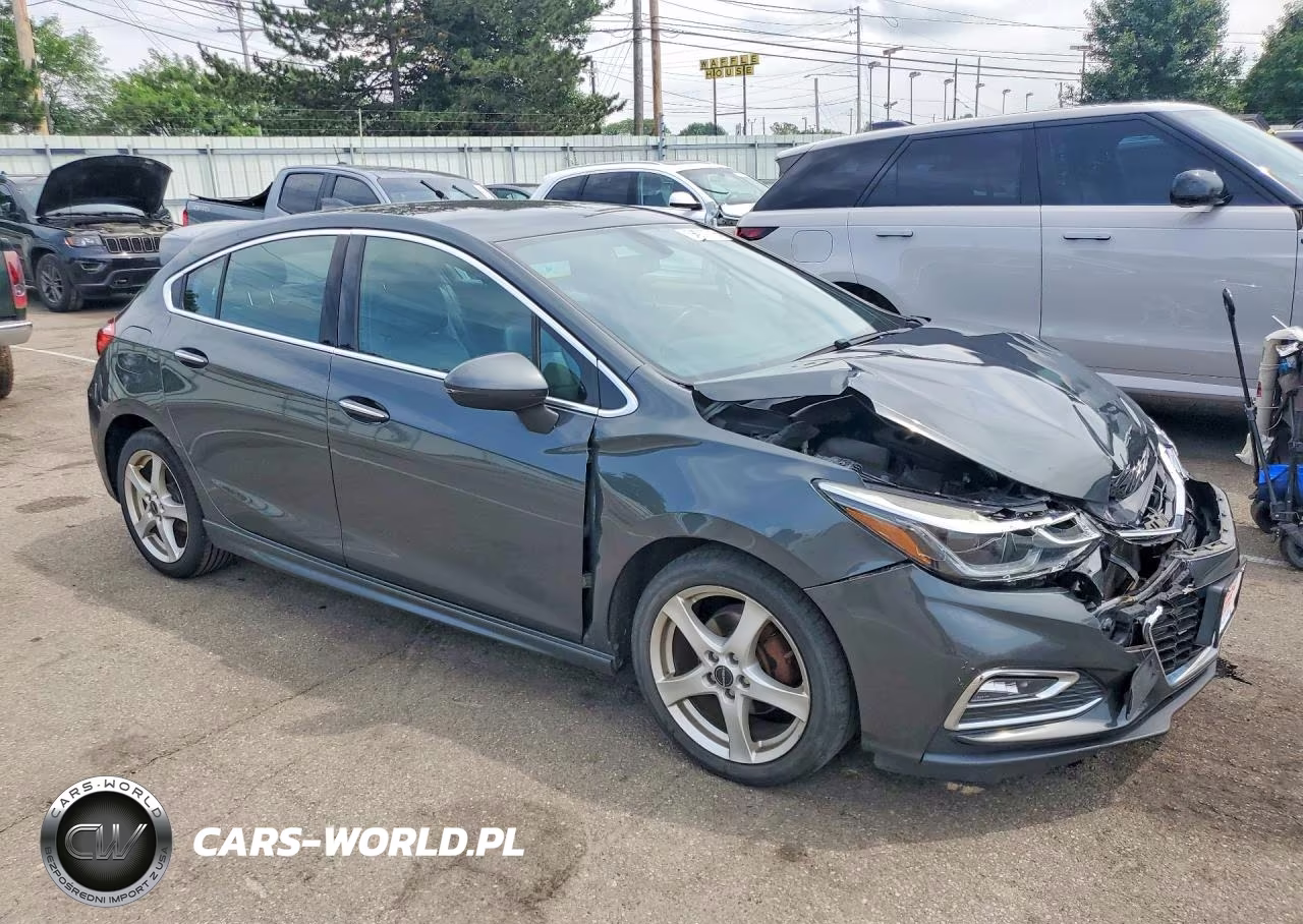 2018 Chevrolet Cruze Premier VIN:3G1BF6SM0JS601874 - 4