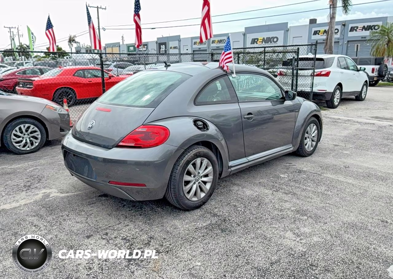 2014 Volkswagen Beetle VIN:3VWFP7AT7EM621339 - 4
