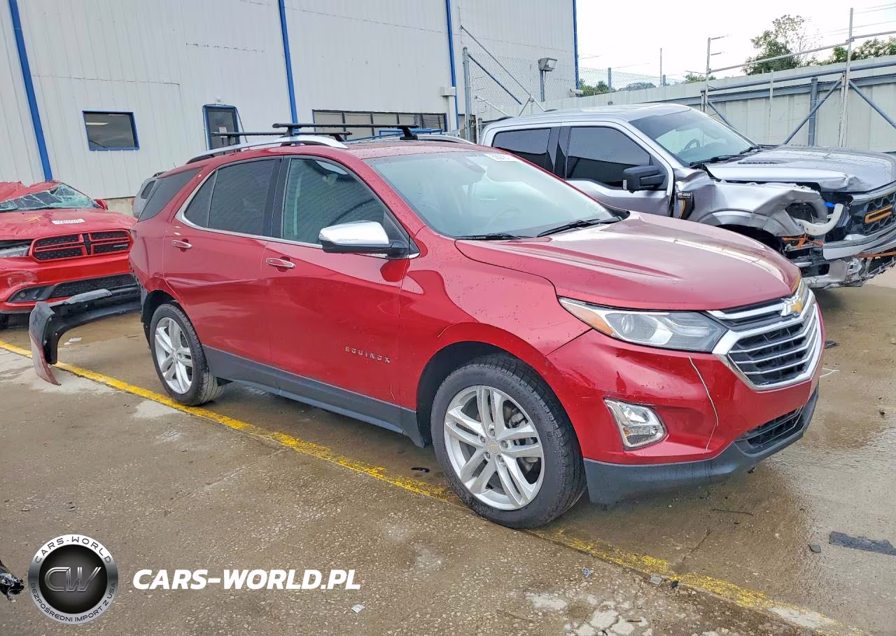 2018 Chevrolet Equinox Premier VIN:2GNAXWEX4J6306093 - 4
