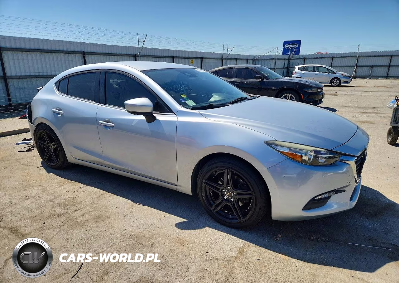 2018 Mazda 3 Touring VIN:3MZBN1V39JM202334 - 4