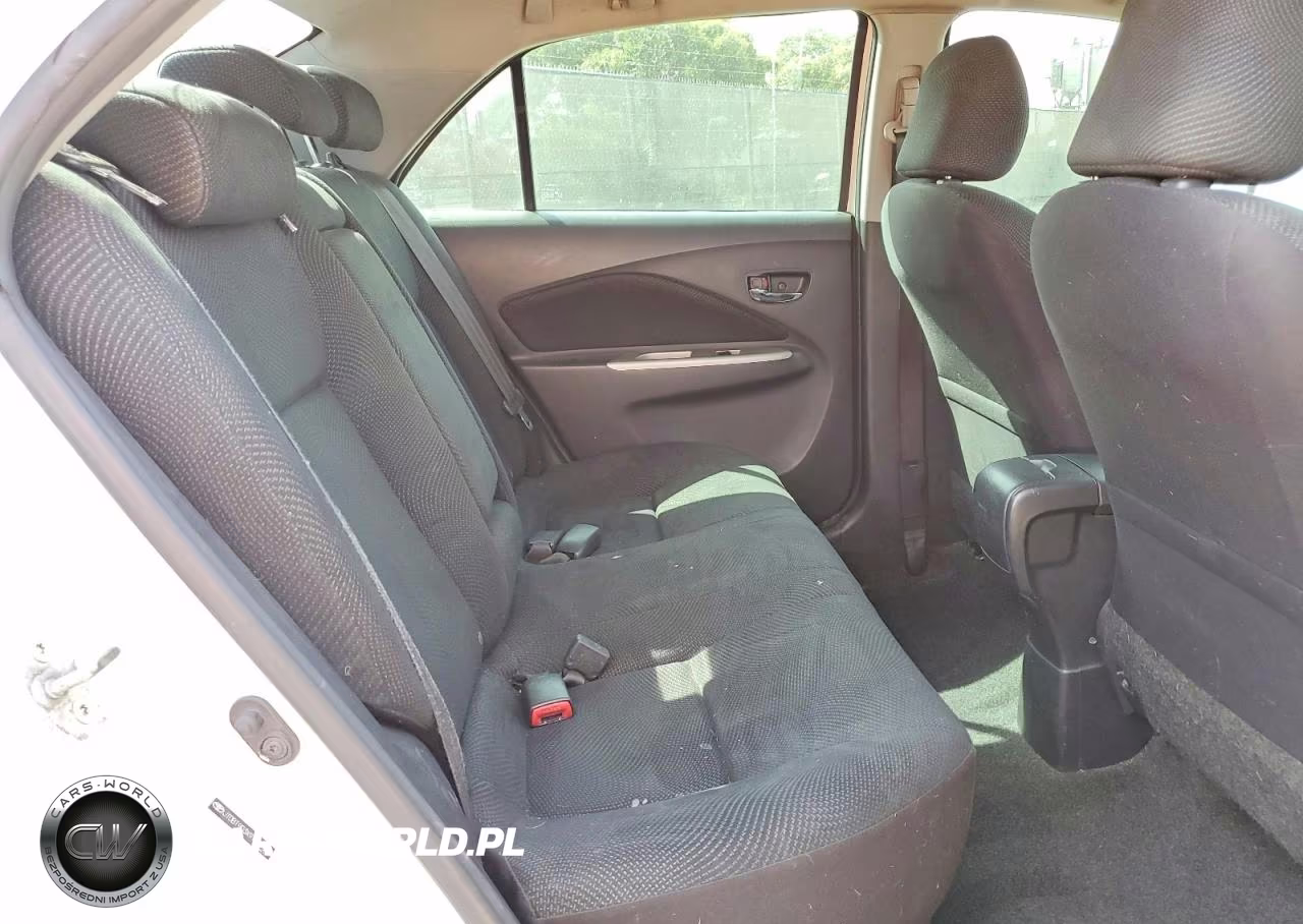 2009 Toyota Yaris Base VIN:JTDBT903X91321095 - 10