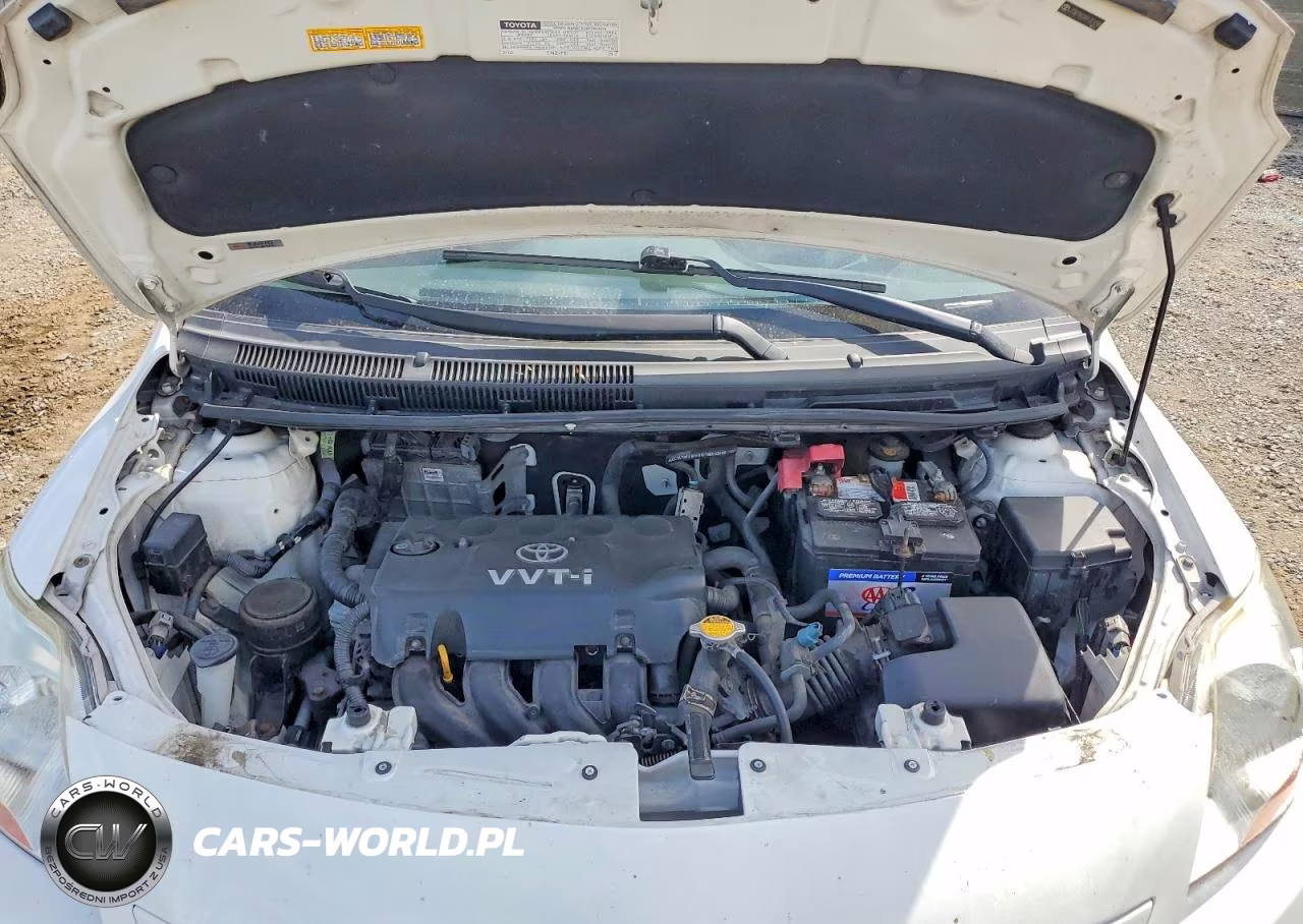 2009 Toyota Yaris Base VIN:JTDBT903X91321095 - 11
