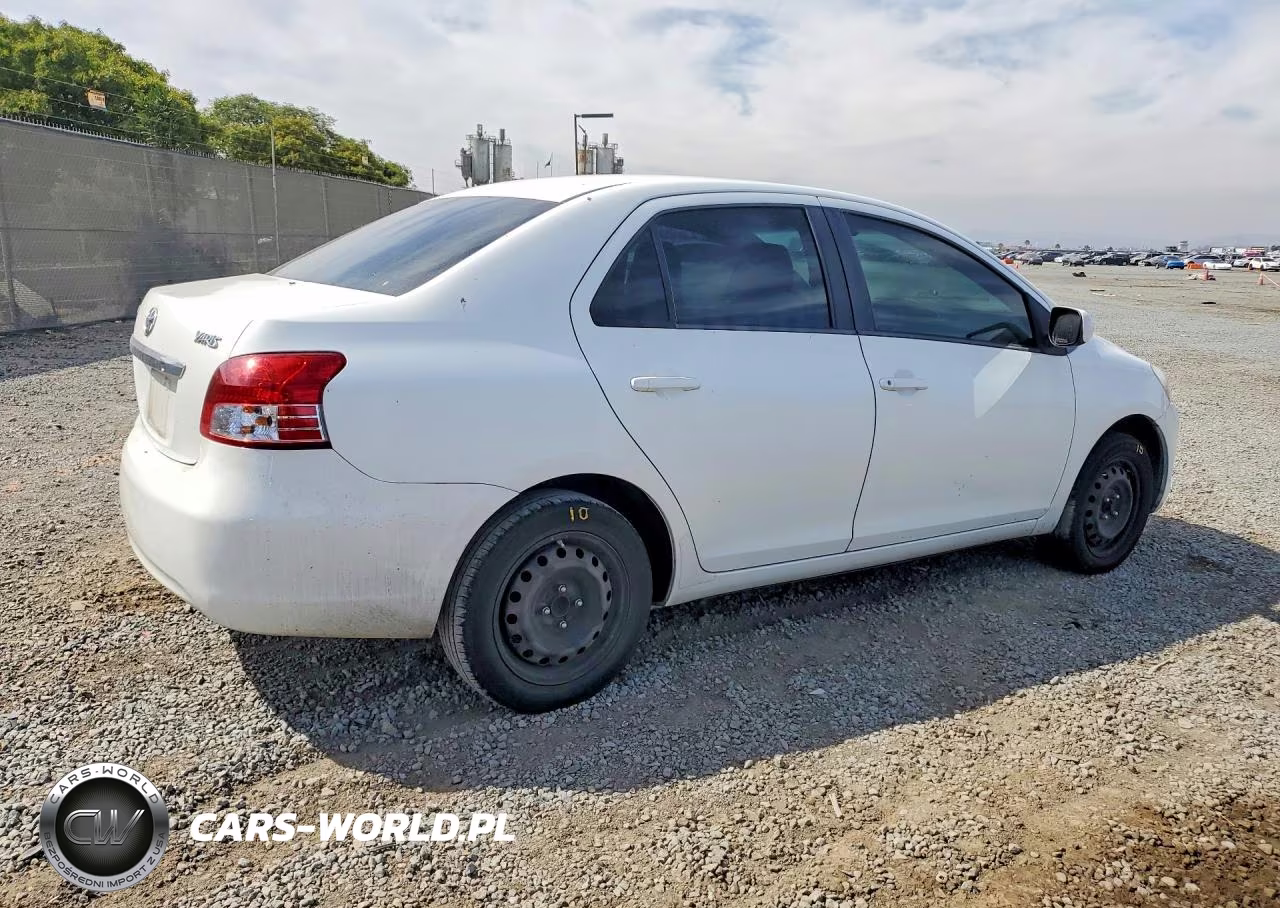 2009 Toyota Yaris Base VIN:JTDBT903X91321095 - 3