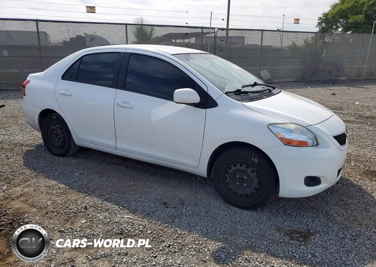 2009 Toyota Yaris Base VIN:JTDBT903X91321095 - 4