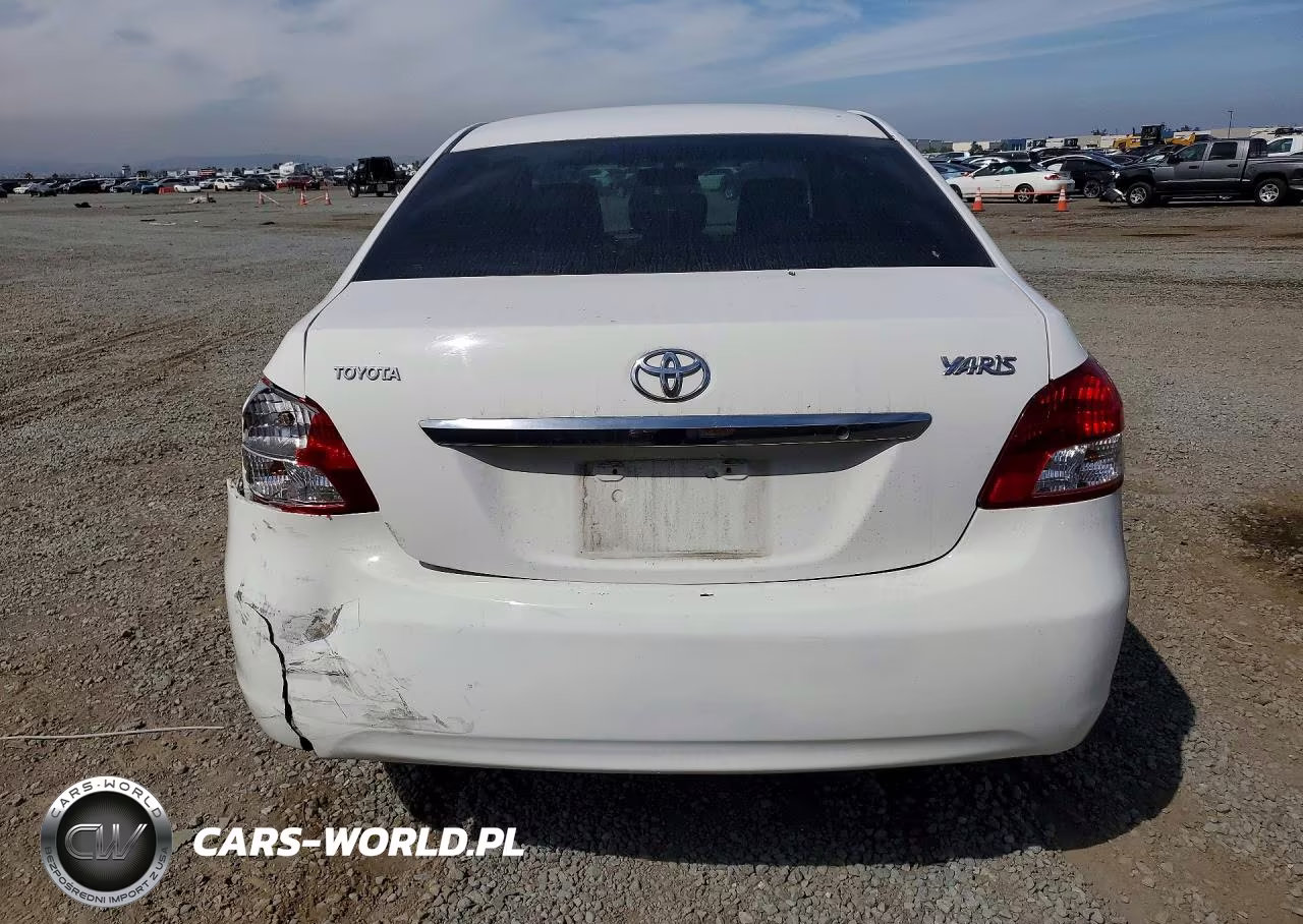 2009 Toyota Yaris Base VIN:JTDBT903X91321095 - 6