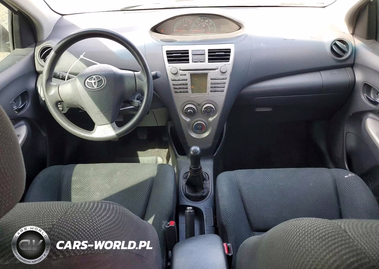2009 Toyota Yaris Base VIN:JTDBT903X91321095 - 8