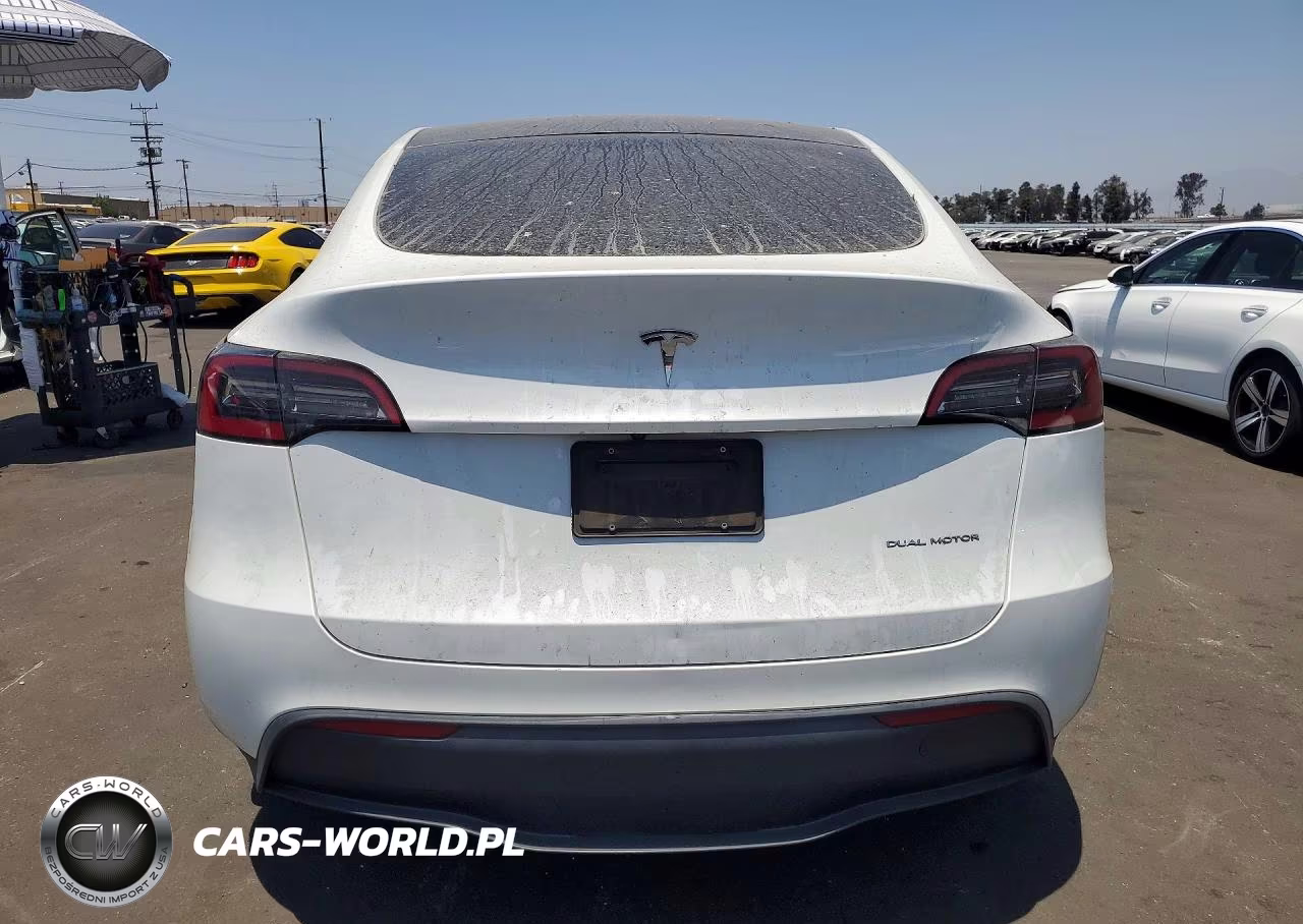 2023 Tesla Model Y VIN:7SAYGDEE8PA066222 - 6