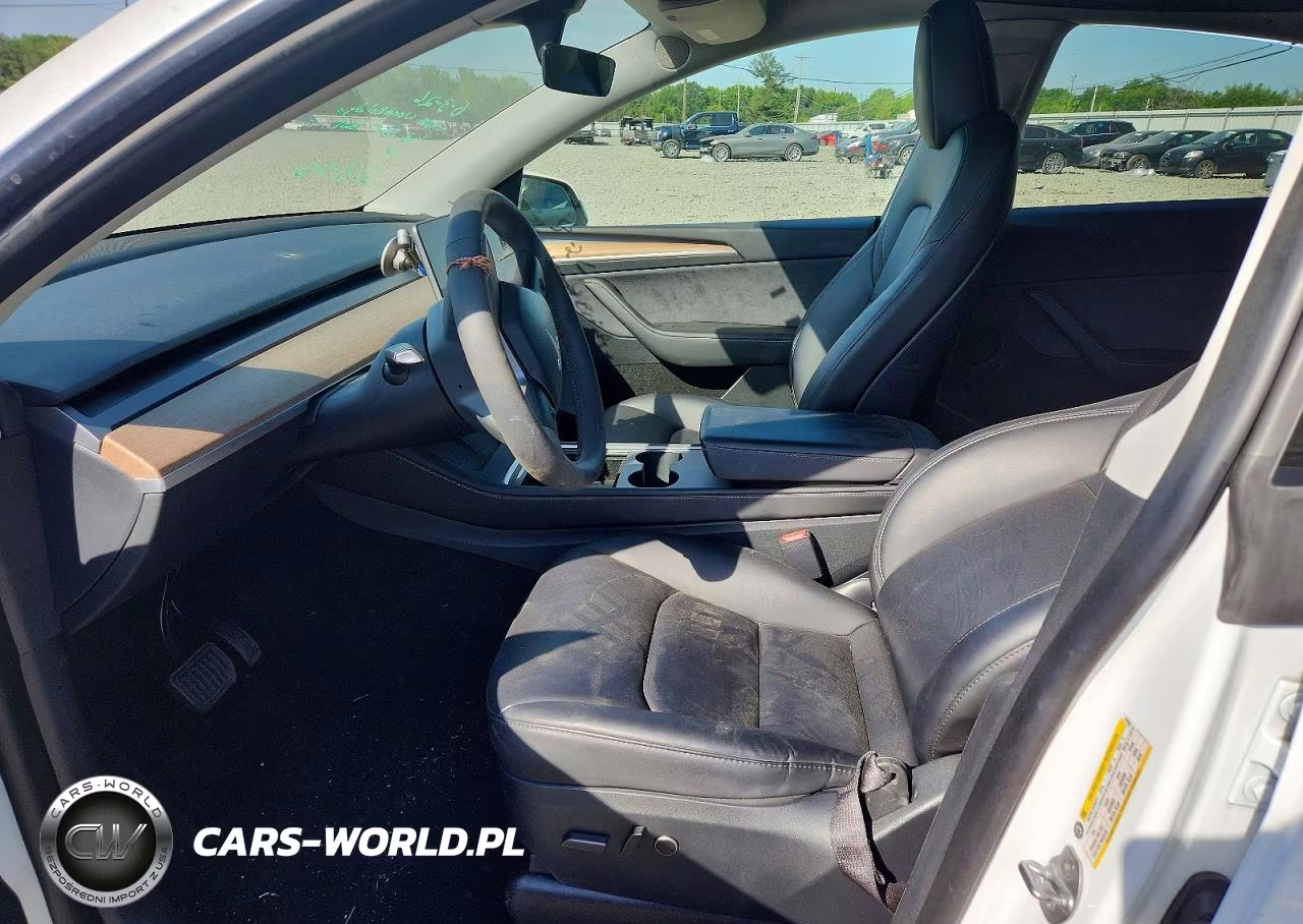 2023 Tesla Model Y VIN:7SAYGAEE7PF742600 - 7