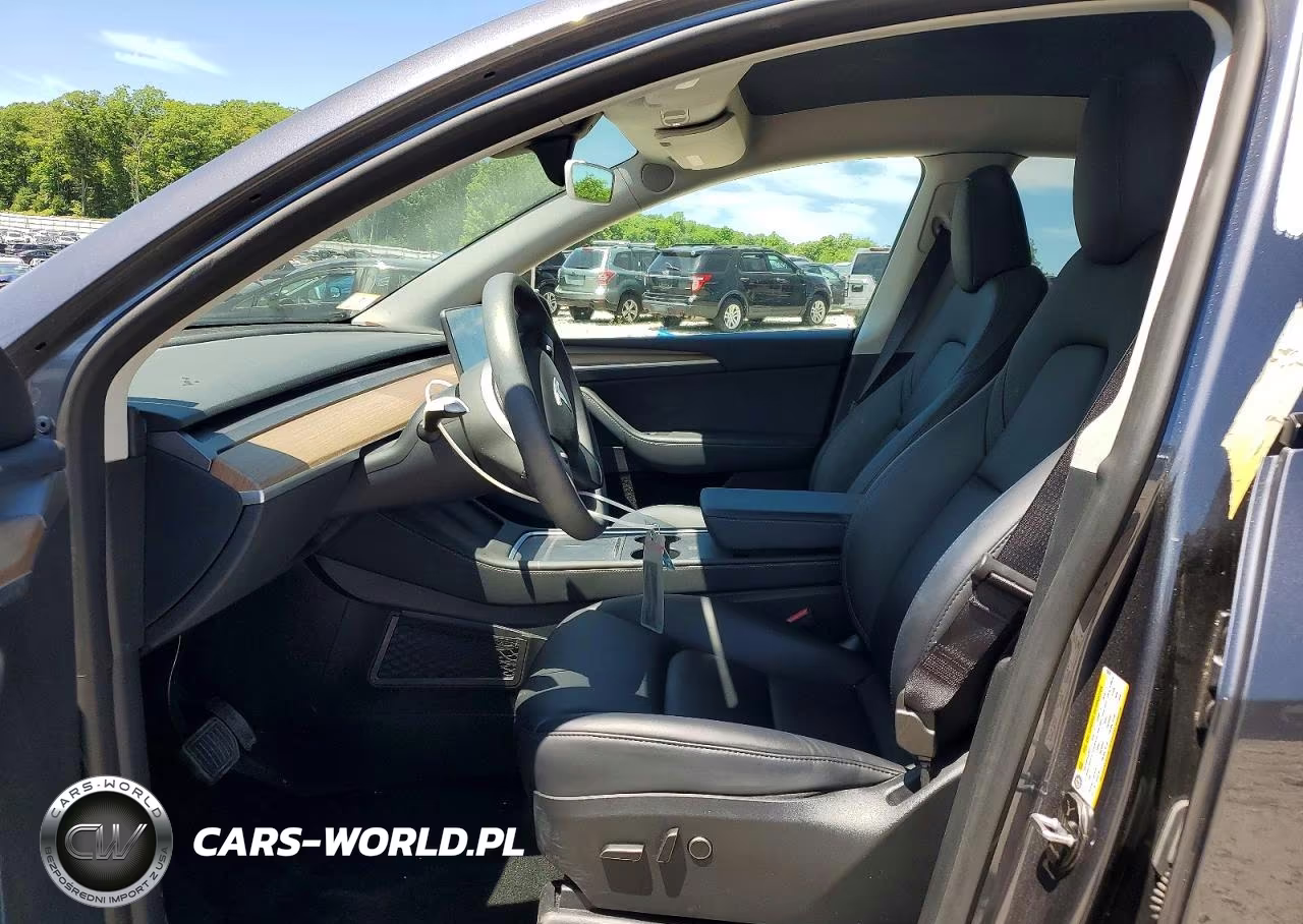 2023 Tesla Model Y VIN:7SAYGDEE9PF836981 - 7