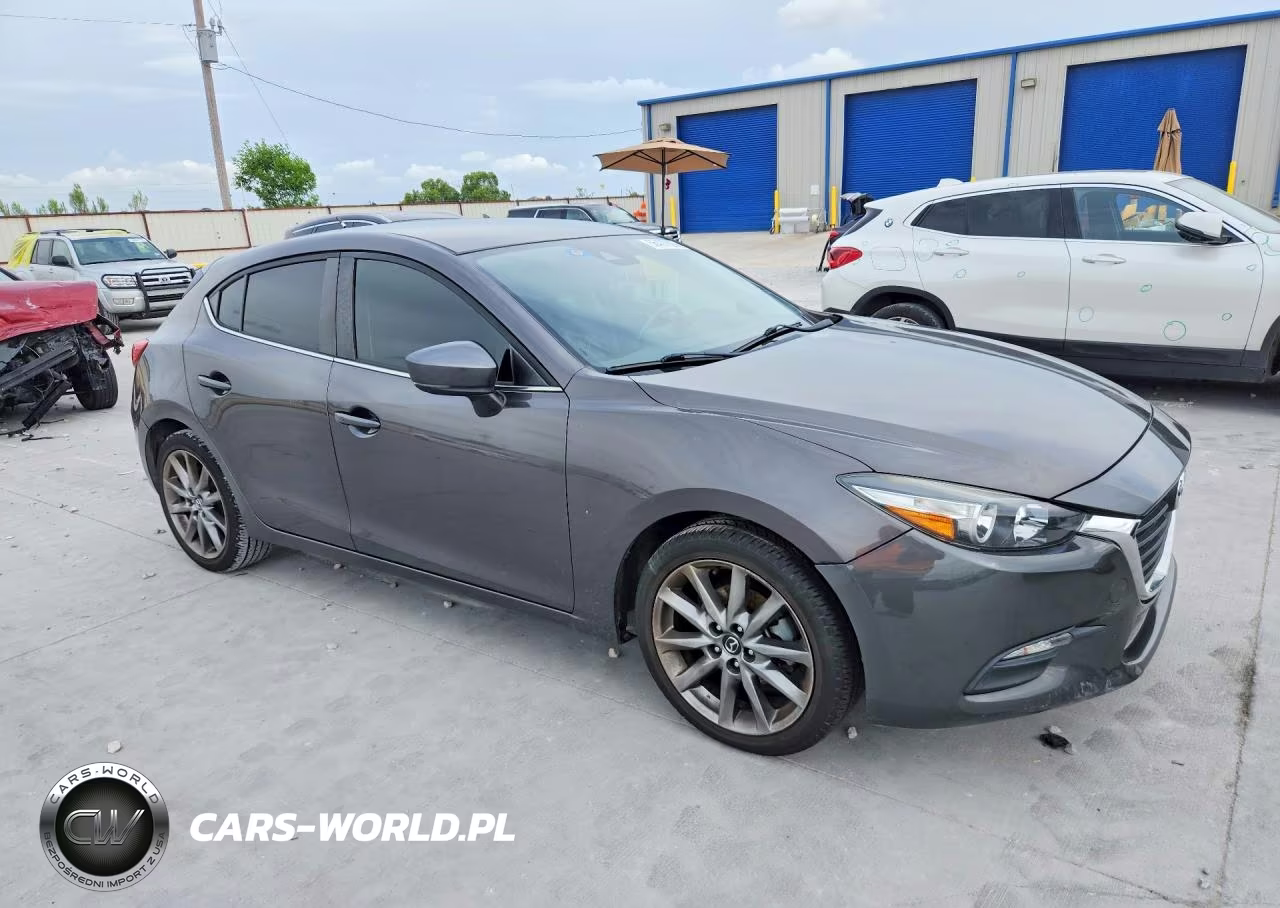 2018 Mazda 3 Touring VIN:3MZBN1L30JM180100 - 4