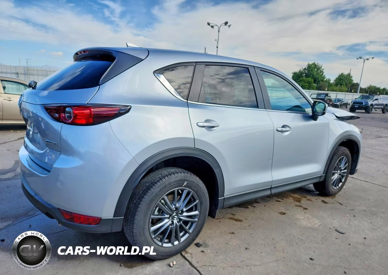 2021 Mazda Cx-5 Touring VIN:JM3KFBCMXM0410027 - 3
