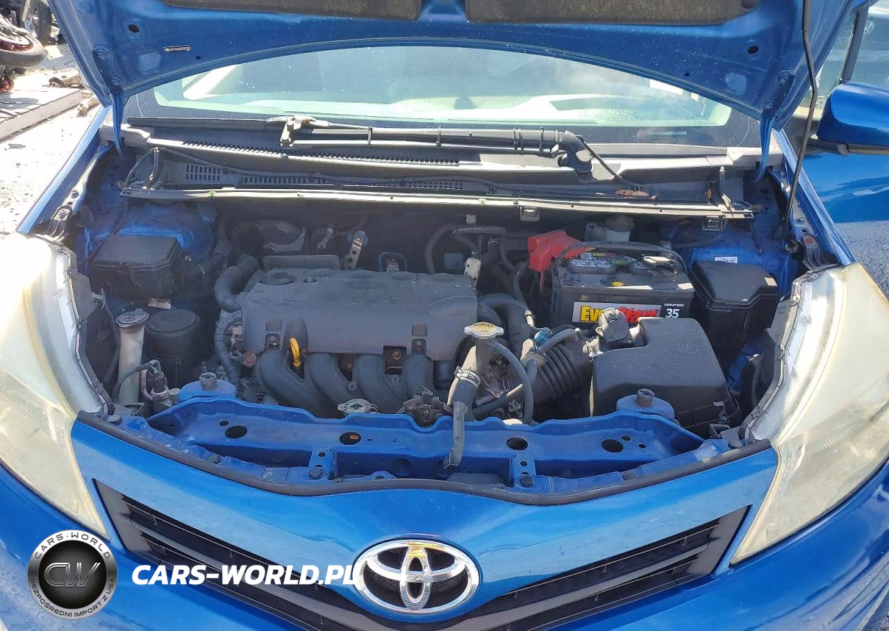 2012 Toyota Yaris 3-Door L VIN:JTDJTUD32CD521029 - 12