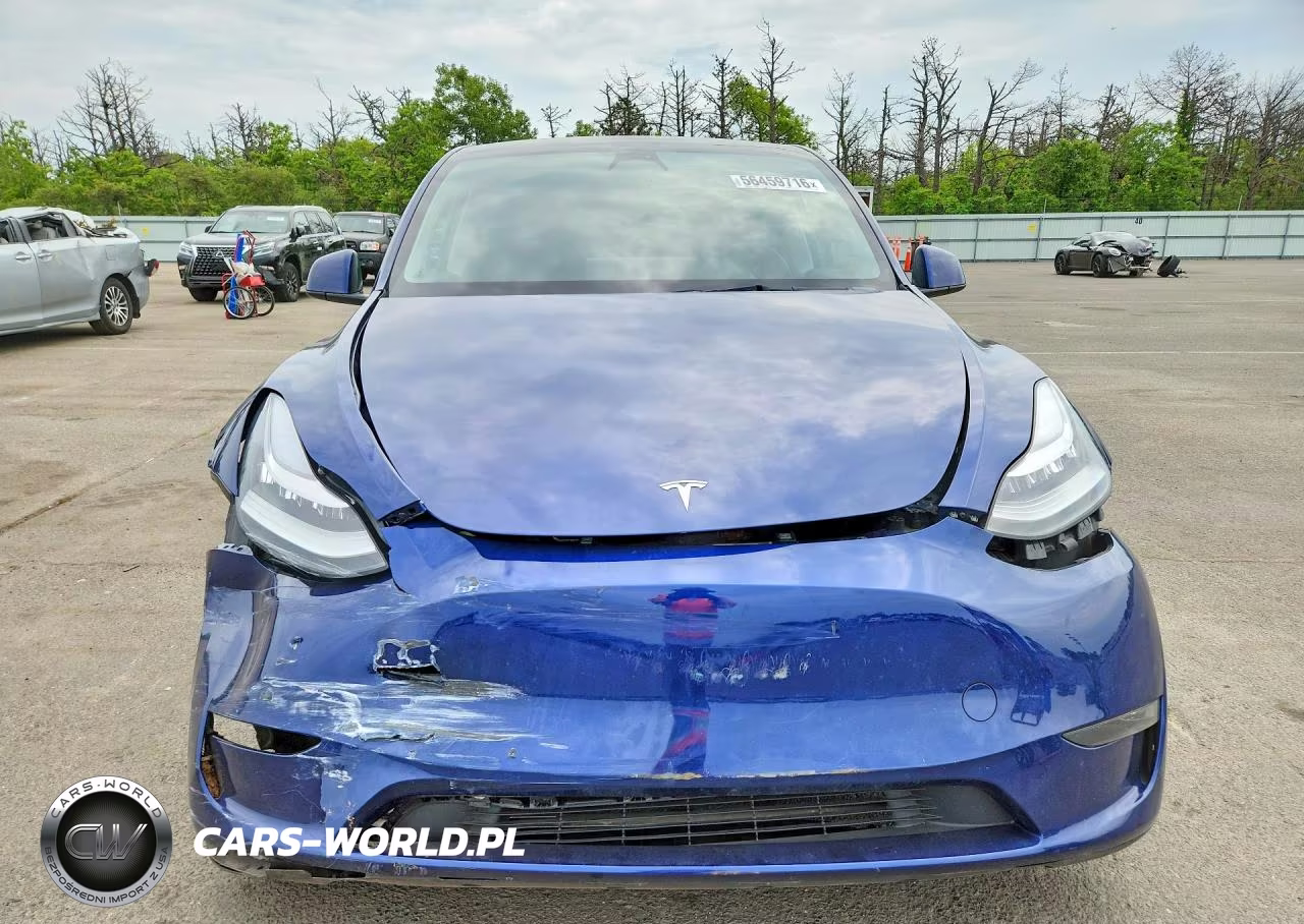 2023 Tesla Model Y VIN:7SAYGDEE1PA043249 - 5