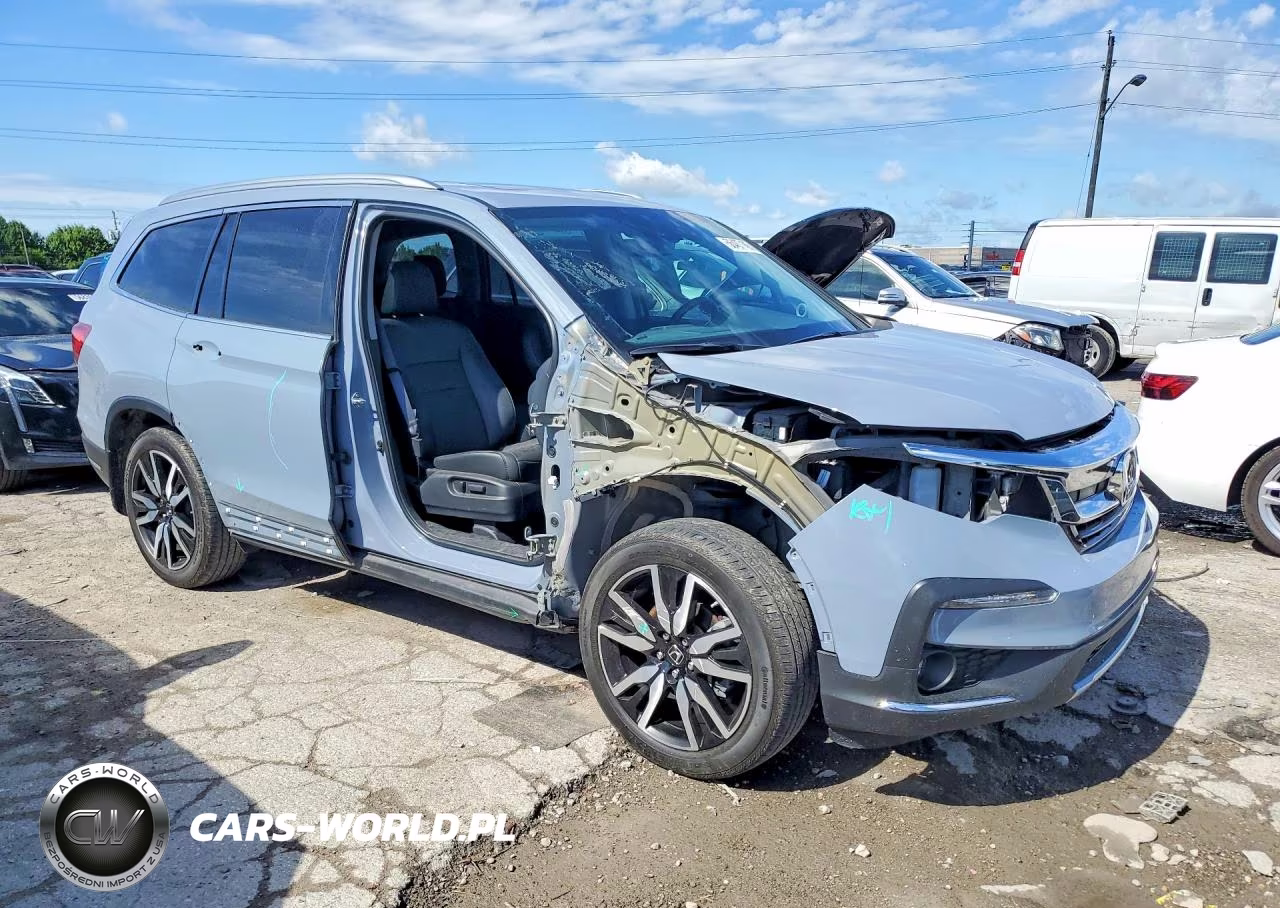 2022 Honda Pilot Touring VIN:5FNYF6H69NB070540 - 4