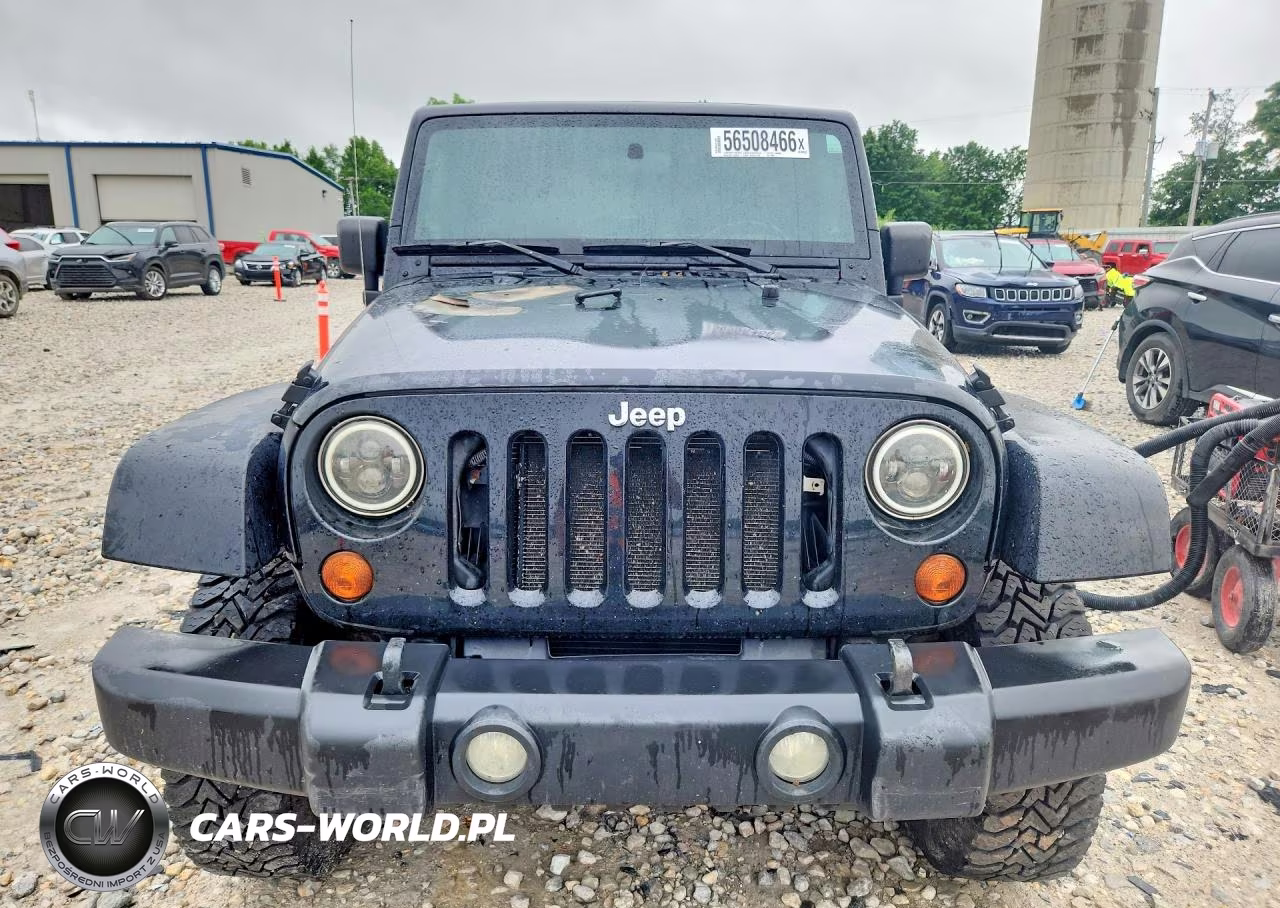 2009 Jeep Wrangler Unlimited Sahara VIN:1J4GA59129L751093 - 5