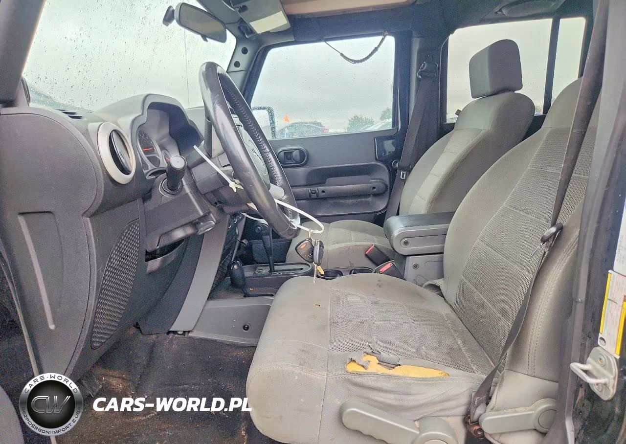 2009 Jeep Wrangler Unlimited Sahara VIN:1J4GA59129L751093 - 7