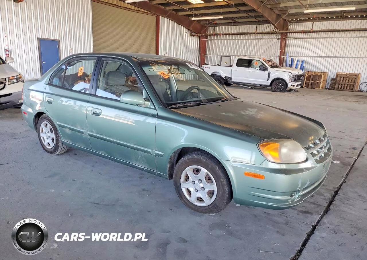 2005 Hyundai Accent Gl VIN:KMHCG45C85U605365 - 4