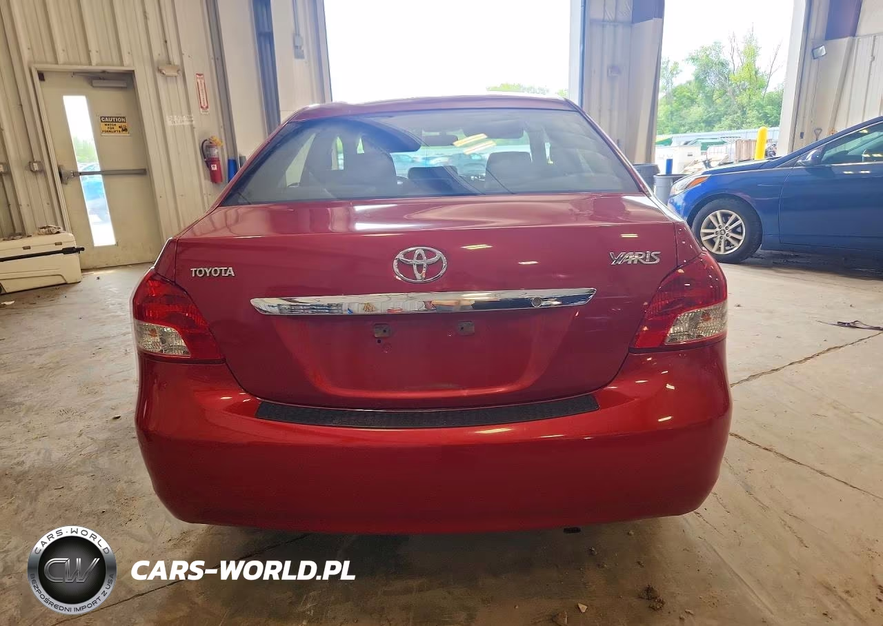 2009 Toyota Yaris Base VIN:JTDBT903X94045371 - 6